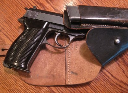 IMG_0263 P38 sliding from holster (1).JPG IMG_0263 P38 sliding from holster (1).JPG