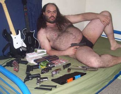 fat hairy gun with guns.jpg