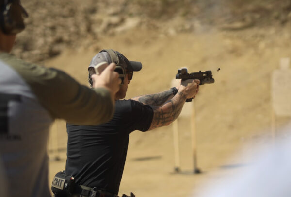 Rick Crawley shooting a Walther PDP with Aimpoint ACRO
